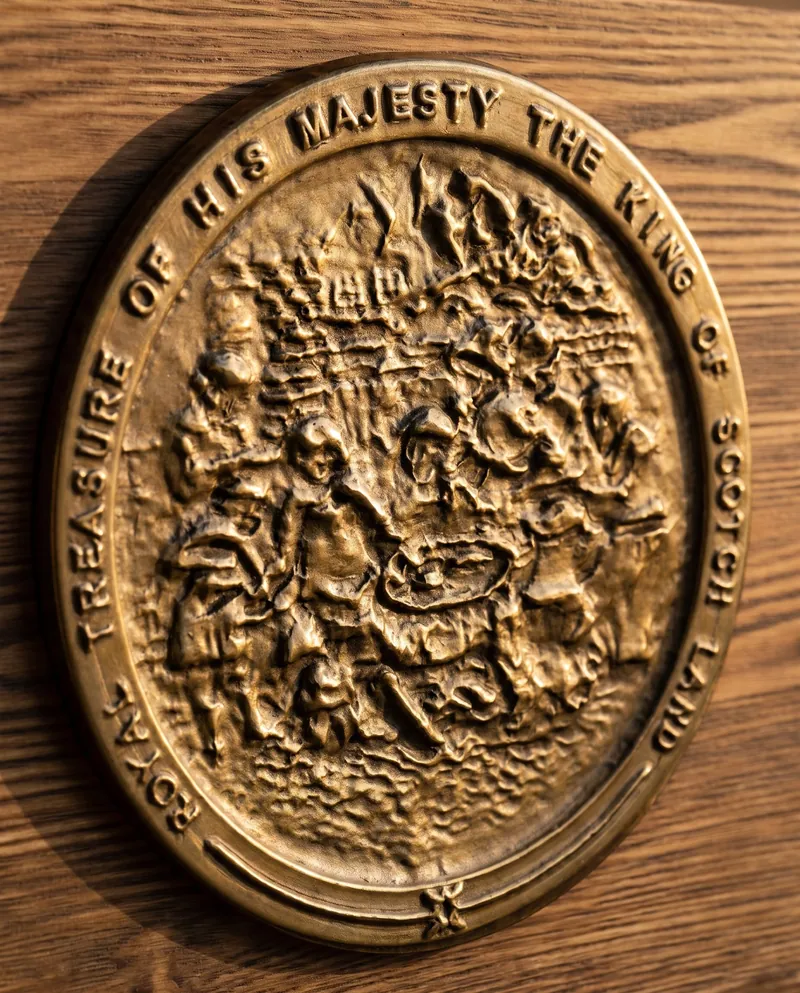 The cast brass medallion